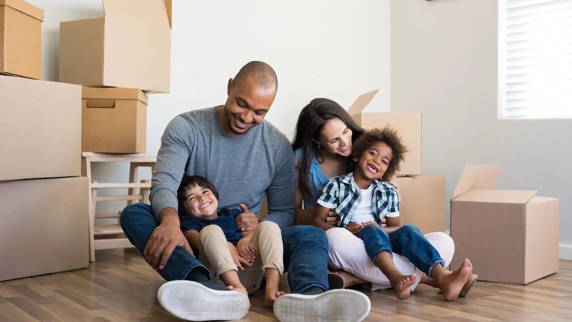 Happy family reviewing their finances together